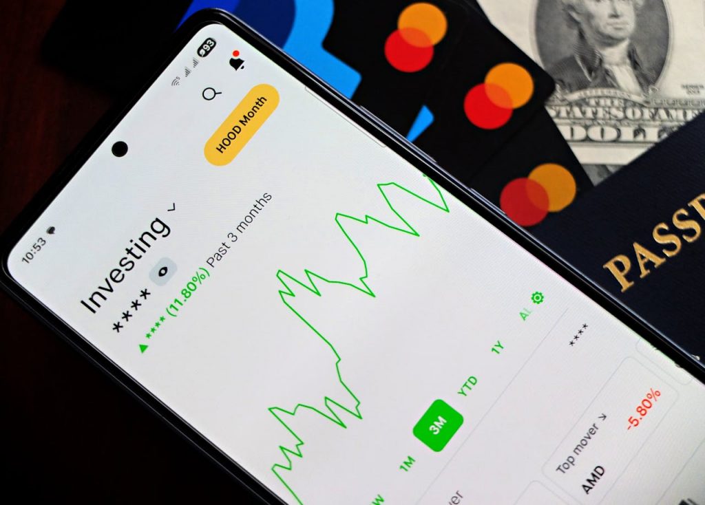 Smartphone displaying investment growth app interface