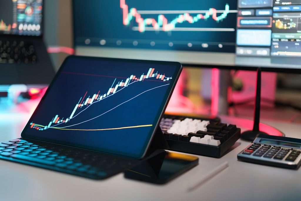 Modern Trading Desk with Graphs and Gadgets