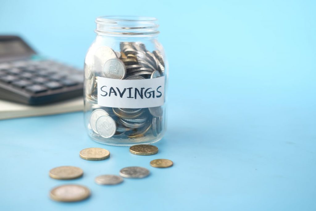 Clear Glass Jar With Silver Coins